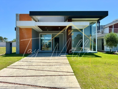 Imagem do imóvel Casa em condomínio 4 dormitórios à venda, Village em Capão Da Canoa referência 64
